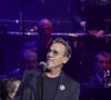 Le chanteur qui s'est fait très discret ces derniers mois alors qu'il luttait contre le cancer...Florent Pagny lors du concert caritatif "Sentinelles d'un soir" au profit de l'association Bleuet de France à la salle Pleyel à Paris le 30 mai 2024. Ce concert destiné au grand public est organisé en l'honneur des orphelins de guerre, des veuves, des familles endeuillées, des victimes du terrorisme et de tous les soldats blessés en mission. Ce concert avec des stars, destiné au grand public, est un exercice nouveau pour les militaires. Le gouverneur militaire de Paris Christophe Abad est chargé du cérémonial dans la Cour d'honneur des Invalides en hommage aux militaires tombés en opération. Il organise également le défilé du 14-Juillet. Et, jusqu'à présent, les concerts ouverts au public étaient plus confidentiels, généralement de la musique classique dans des "emprises militaires" comme la cathédrale Saint-Louis des Invalides ou la chapelle du Val-de-Grâce. Florent Pagny ne devait remonter sur scène qu'en 2026. Finalement, il a fait dix-sept heures de vol (avec trois correspondances) depuis sa Patagonie pour revenir à Paris le temps d'un concert. Un voyage extrêmement fatigant pour être, jeudi 30 mai, l'une des têtes d'affiche des Sentinelles d'un soir, concert caritatif organisé par le général Christophe Abad, gouverneur militaire de Paris, à la salle Pleyel. © Jack Tribeca / Bestimage 