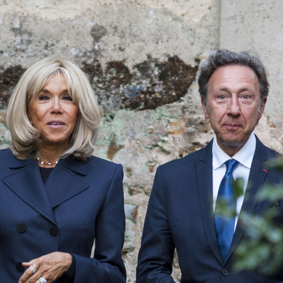 Brigitte Macron complice avec Stéphane Bern 
 
Brigitte Macron et Stéphane Bern lors du déplacement du président de république, à l'occasion de la 41ème édition des journées européennes du patrimoine à Chartres, visite des ateliers de la Maison Lorin maitre verrier - Chartres. © Arnaud Hebert / Pool / Bestimage