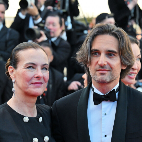 Carole Bouquet et son fils Dimitri Rassam - Montée des marches du film " Megalopolis " lors du 77ème Festival International du Film de Cannes, au Palais des Festivals à Cannes. Le 16 mai 2024