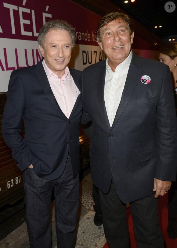 Michel Drucker et Jean-Pierre Foucault - Inauguration "Le Train de la Télé" à Paris Gare de Lyon le 6 octobre 2014.