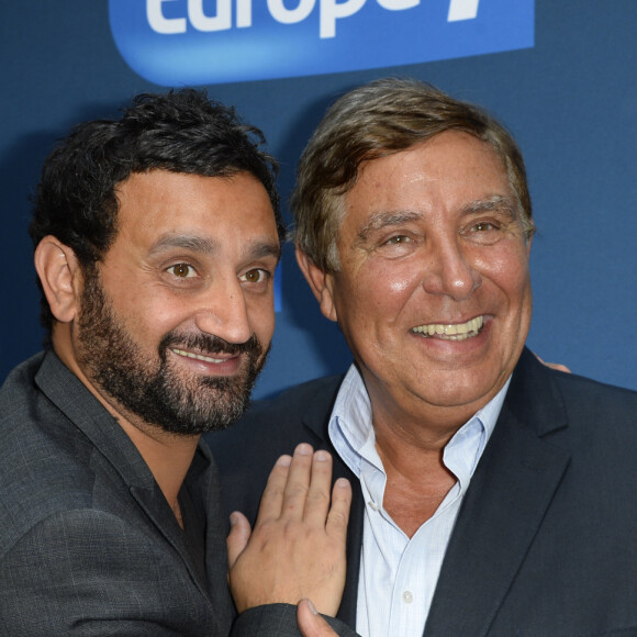 Cyril Hanouna et Jean-Pierre Foucault - Conférence de rentrée de Europe 1 à Paris. Le 3 septembre 2014