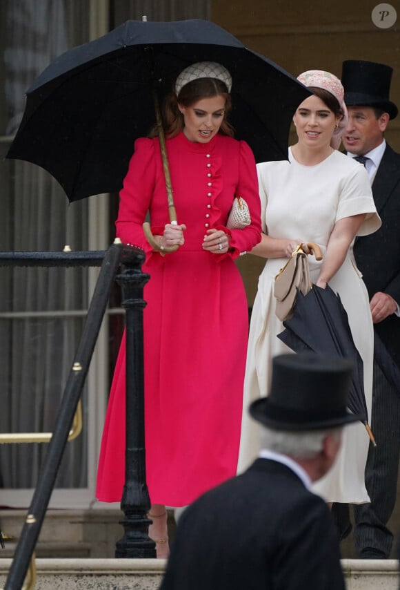 La princesse Beatrice d'York, la princesse Eugenie d'York lors de la "Garden Party du Souverain" au palais de Buckingham à Londres, le 21 mai 2024. 