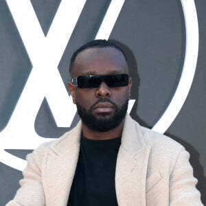 Un défilé auquel Gims a également assisté, très stylé 
Gims - Célébrités au Défilé Louis Vuitton, Collection Prêt-à-porter Printemps / Eté 2025 dans le cadre de la Fashion Week de Paris, France, le 1er Octobre 2024. © Bertrand Rindoff / Bestimage 