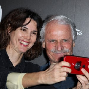 Eglantine Emeye, Yann Arthus-Bertrand assistant à l'avant-première de Woman qui s'est tenue à l'UGC Normandie à Paris, France, le 3 mars 2020.