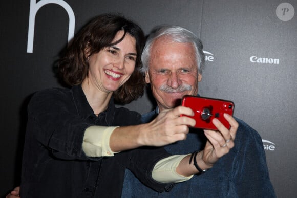 Eglantine Emeye, Yann Arthus-Bertrand assistant à l'avant-première de Woman qui s'est tenue à l'UGC Normandie à Paris, France, le 3 mars 2020.