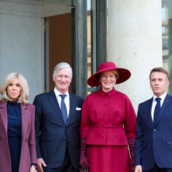 Brigitte Macron et le président de République, Emmanuel Macron, ont reçu la visite d'un couple royal
 
Brigitte Macron, le roi Philippe de Belgique, la reine Mathilde, le président Emmanuel Macron au palais de l'Elysée à Paris le 14 octobre 2024. Le couple royal de Belgique démarre une visite d'état de trois jours en France. © Dominique Jacovides / Bestimage