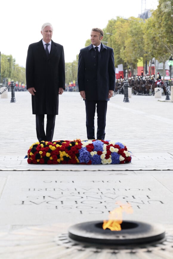 Cérémonie d'accueil officiel du roi Philippe et la reine Mathilde de Belgique par le Président de la République E.Macron et la première dame B.Macron au pied de l'Arc de Triomphe, le 14 octobre 2024. Leurs Majestés le Roi et la Reine des Belges sont en visite d'Etat en France du 14 au 16 octobre 2024. © Benoît Doppagne / Pool / Photonews / Bestimage