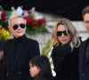 Laeticia Hallyday, Joy et Jade, Laura Smet et David Hallyday lors de la cérémonie funéraire organisée en mémoire de Johnny Hallyday à Paris.Le convoi funéraire est parti de l'Arc de Triomphe puis a descendu les Champs Elysées jusqu'à la place de la Concorde avant de se rendre à l'église de la Madeleine pour un office religieux. Le président de la République et son épouse ont participé à l'office religieux. Les musiciens de Johnny Hallyday ont accompagné le convoi funéraire lors de la procession.Photo par Christian Liewig Abacapress.com