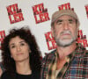 Les Sy n'étaient pas les seuls à être présents puisqu'Eric Cantona, qui est au casting du film, et Rachida Brakni ont, eux aussi, pris la pose. 
Rachida Brakni et Eric Cantona - Avant-première du film "The Killer" au cinéma Pathé Palace à Paris © Coadic Guirec / Olivier Borde / Bestimage