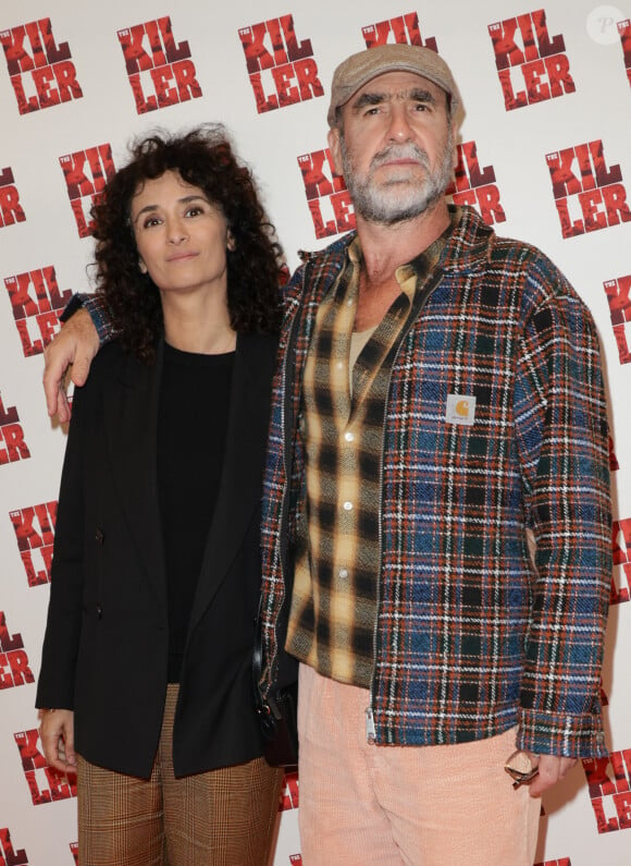 Les Sy n'étaient pas les seuls à être présents puisqu'Eric Cantona, qui est au casting du film, et Rachida Brakni ont, eux aussi, pris la pose. 
Rachida Brakni et Eric Cantona - Avant-première du film "The Killer" au cinéma Pathé Palace à Paris © Coadic Guirec / Olivier Borde / Bestimage