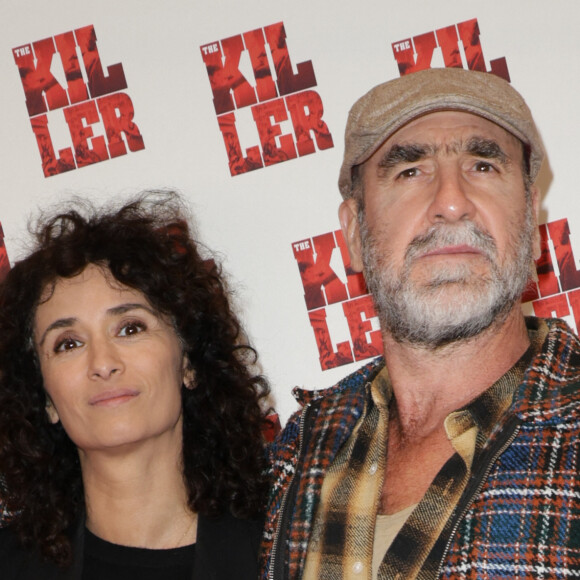 Les Sy n'étaient pas les seuls à être présents puisqu'Eric Cantona, qui est au casting du film, et Rachida Brakni ont, eux aussi, pris la pose. 
Rachida Brakni et Eric Cantona - Avant-première du film "The Killer" au cinéma Pathé Palace à Paris © Coadic Guirec / Olivier Borde / Bestimage