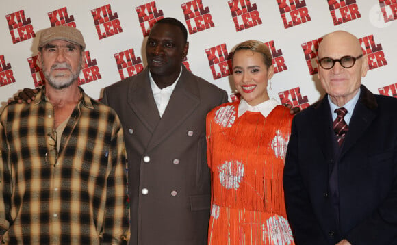 Nathalie Emmanuel, la tueuse du film de John Woo avait, elle aussi, fait le déplacement. 
Eric Cantona, Omar Sy, Nathalie Emmanuel et Tchéky Karyo - Avant-première du film "The Killer" au cinéma Pathé Palace à Paris © Coadic Guirec / Olivier Borde / Bestimage