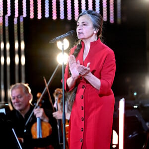 Exclusif - Catherine Ringer - Enregistrement de l'émission "Cannes chante le Cinéma" sur la célèbre plage Macé de Cannes, le 25 mai 2023 lors de la 76ème édition du Festival de Cannes le 25 mai 2023. La diffusion du show se fera sur France 2, le samedi 27 mai après la cérémonie de la remise de la Palme d'Or qui est retransmise en direct depuis le Palais des Festivals. Cette soirée exceptionnelle réunira les plus grands artistes de la musique et du cinéma pour célébrer le 7ème art en musique, offrant ainsi un hommage vibrant au monde du cinéma. Ce concert, qui se déroulera en plein air dans un cadre somptueux, marquera la clôture de la 76e édition du Festival de Cannes. Les artistes interpréteront en solo ou en duo les plus belles chansons de films français et internationaux, accompagnés par l'Orchestre national de Cannes sous la direction de Benjamin Levy. Parmi les artistes attendus figurent C. and the Queen, S. Pamart, Louane, C. Ringer, T. Dutronc et bien d'autres. Leur performance donnera vie aux musiques emblématiques du cinéma dans un concert unique. Cet événement exceptionnel sera diffusé sur France 2, le samedi 27 mai à 21h50, permettant ainsi au public de revivre les moments forts de cette soirée magique. Il est à noter que l'entrée est libre dans la limite des places disponibles, avec une réservation préalable requise. L'événement "Cannes chante le cinéma" promet d'être une soirée mémorable, où les mélodies du cinéma résonneront sous les étoiles de Cannes, créant ainsi une symbiose parfaite entre la musique et le 7ème art. © Bruno Bebert-Tiziano da Silva/Bestimage 