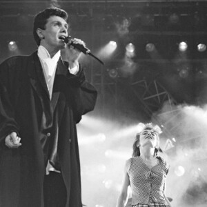 ARCHIVES - MARC LAVOINE ET CATHERINE RINGER (RITA MITSOUKO) SUR SCENE LORS DE LA SOIREE POUR LE 1ER ANNIVERSAIRE DE CANAL PLUS EN 1985  