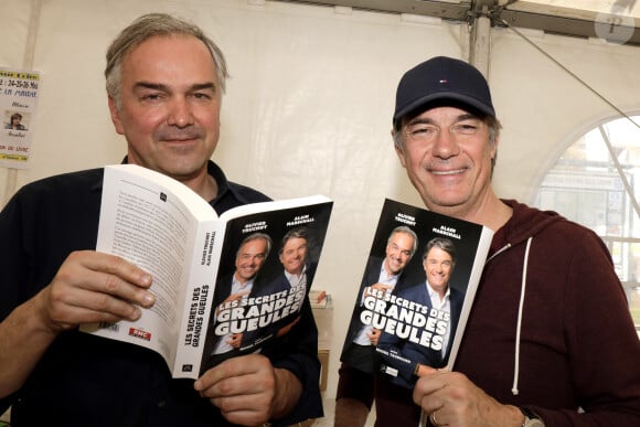 Olivier Truchot et alain Marschall - 31ème Salon du livre de Cosne-sur-Loire le 26 mai 2019. © Cédric Perrin / Bestimage 