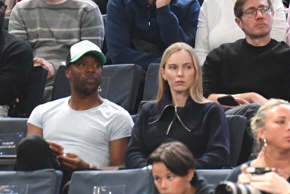 Sylvain Wiltord et une amie - Célébrités assistent à la finale du tournoi de tennis ATP Masters 1000 de Paris (Paris Rolex Master) remportée par Alexander Zverev contre Ugo Humbert à l'Accor Arena - Palais Omnisports de Paris-Bercy, Paris le 3 novembre 2024. © Veeren/Bestimage 