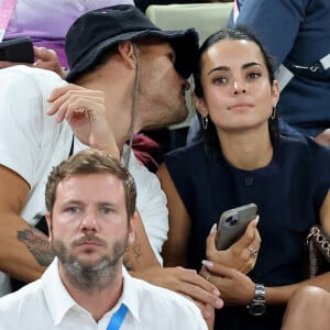 Florent Manaudou et sa compagne Lola Dumenil - Les célébrités en tribunes pendant l'épreuve de basketball de Demi-Finale opposant la France à l'Allemagne lors des Jeux Olympiques de Paris 2024 (JO) à l'Arena Bercy, à Paris, France, le 8 août 2024. © Jacovides-Perusseau/Bestimage 