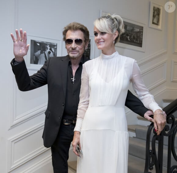 Johnny Hallyday et sa femme Laeticia Hallyday - People au défilé de mode Haute-Couture automne-hiver 2016/2017 "Christian Dior" à Paris. Le 4 juillet 2016 © Olivier Borde / Bestimage 