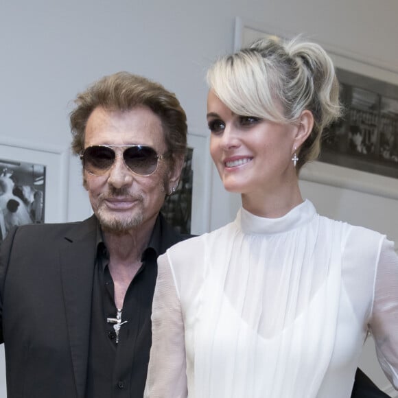 Johnny Hallyday et sa femme Laeticia Hallyday - People au défilé de mode Haute-Couture automne-hiver 2016/2017 "Christian Dior" à Paris. Le 4 juillet 2016 © Olivier Borde / Bestimage 