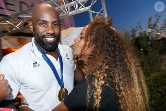 Exclusif - Teddy Riner et sa femme Luthna - Teddy Riner fête son titre de champion Olympique de judo +100KG au restaurant "Podium" du groupe (Les bistrots Pas Parisiens) à Paris le 2 aout 2024. © Rachid Bellak/Bestimage