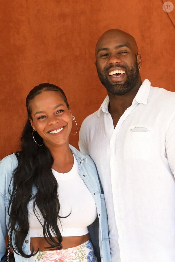 Teddy Riner et sa femme Luthna Plocus au village lors des internationaux de France Roland Garros à Paris le 13 juin 2021. © Dominique Jacovides / Bestimage