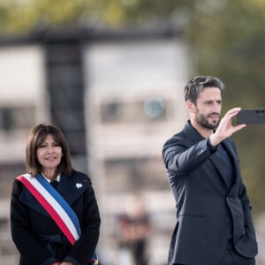 Anne Hidalgo (maire de Paris) et Tony Estanguet (président du Comité d'organisation des Jeux Olympiques et Paralympiques de Paris 2024). La Parade des Champions, dernière célébration et décoration des athlètes médaillés lors des Jeux Olympiques et Paralympiques de Paris2024, au pied de l'Arc de Triomphe. Paris, le 14 Septembre 2024. © Nicolas Messyasz/Pool/Bestimage