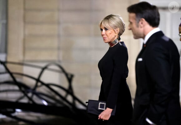 Brigitte Macron et Emmanuel Macron - Dîner d'Etat en l'honneur de Bola Tinubu, Président de la République fédérale du Nigéria et de sa femme Oluremi Tinubu au Palais de l'Elysée à Paris le 28 Novembre 2024. © Dominique Jacovides/Bestimage 