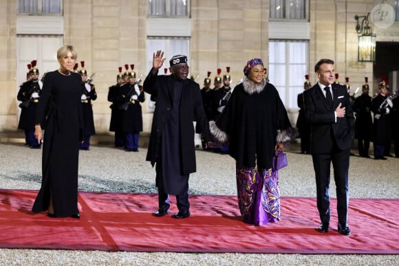 Brigitte Macron et Emmanuel Macron, Bola Tinubu et Oluremi Tinubu - Dîner d'Etat en l'honneur de Bola Tinubu, Président de la République fédérale du Nigéria et de sa femme Oluremi Tinubu au Palais de l'Elysée à Paris le 28 Novembre 2024. © Dominique Jacovides/Bestimage 