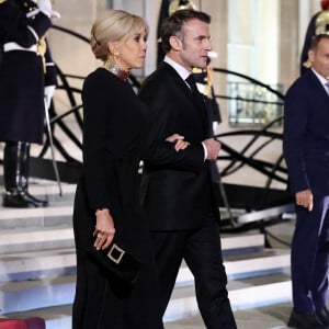 Brigitte et Emmanuel Macron - Dîner d'Etat en l'honneur de Bola Tinubu, Président de la République fédérale du Nigéria et de sa femme Oluremi Tinubu au Palais de l'Elysée à Paris le 28 Novembre 2024. © Dominique Jacovides/Bestimage 