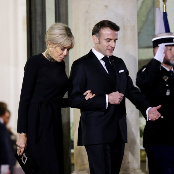 Brigitte et Emmanuel Macron - Dîner d'Etat en l'honneur de Bola Tinubu, Président de la République fédérale du Nigéria et de sa femme Oluremi Tinubu au Palais de l'Elysée à Paris le 28 Novembre 2024. © Dominique Jacovides/Bestimage 