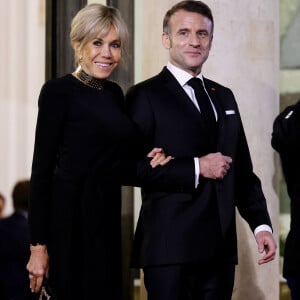 Brigitte et Emmanuel Macron - Dîner d'Etat en l'honneur de Bola Tinubu, Président de la République fédérale du Nigéria et de sa femme Oluremi Tinubu au Palais de l'Elysée à Paris le 28 Novembre 2024. © Dominique Jacovides/Bestimage 