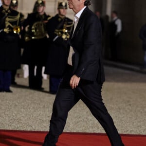 Xavier Niel - Dîner d'Etat en l'honneur de Bola Tinubu, Président de la République fédérale du Nigéria et de sa femme Oluremi Tinubu au Palais de l'Elysée à Paris le 28 Novembre 2024. © Dominique Jacovides/Bestimage  State Dinner in honor of Bola Tinubu, President of the Federal Republic of Nigeria and his wife Oluremi Tinubu at the Elysée Palace in Paris on November 28, 2024. 