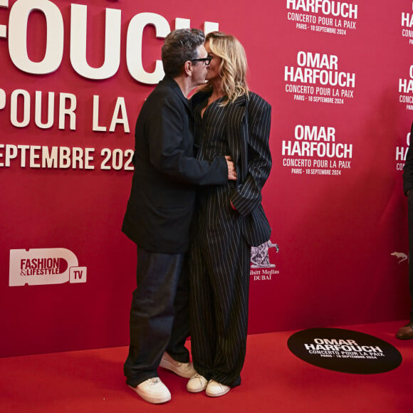 Marc Lavoine et sa compagne Adriana Karembeu au photocall du "concerto pour la paix" de Omar Harfouch au Théâtre des Champs-Elysées à Paris le 18 septembre 2024. © Perusseau / Tribeca / Bestimage 