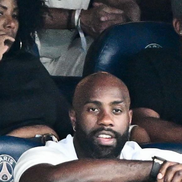Teddy Riner et sa femme Luthna Plocus lors du match de football pour la médaille d'or entre la France et l'Espagne pendant les Jeux olympiques de Paris 2024 au Parc des Princes à Paris, France, le 9 août 2024. Photo par David Niviere/ABACAPRESS.COM