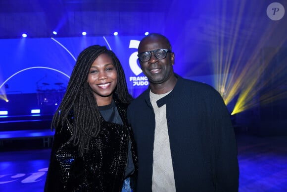 Exclusif - Lilian Thuram et sa femme Kareen Guiock-Thuram - Soirée de remerciement de Teddy Riner à la Maison du judo à Montrouge, le 29 novembre 2024. Devant une centaine d'invités, Le champion olympique (11 fois) et champion olympique (5 fois) a tenu à remercier tous ceux qui l'ont soutenu tout au long de son impressionnante carrière, de son premier entraîneur en club jusqu'à sa femme et sa mère, en passant par sa psychologue de l'INSEP. Une vente aux enchères au profit de l'association de Teddy Riner a conclu la soirée. © Rachid Bellak / Bestimage 