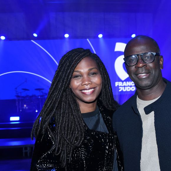 Exclusif - Lilian Thuram et sa femme Kareen Guiock-Thuram - Soirée de remerciement de Teddy Riner à la Maison du judo à Montrouge, le 29 novembre 2024. Devant une centaine d'invités, Le champion olympique (11 fois) et champion olympique (5 fois) a tenu à remercier tous ceux qui l'ont soutenu tout au long de son impressionnante carrière, de son premier entraîneur en club jusqu'à sa femme et sa mère, en passant par sa psychologue de l'INSEP. Une vente aux enchères au profit de l'association de Teddy Riner a conclu la soirée. © Rachid Bellak / Bestimage 