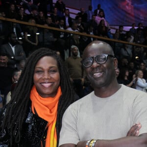 Lilian Thuram et sa femme Kareen Guiock-Thuram - Soirée de remerciement de Teddy Riner à la Maison du judo à Montrouge, le 29 novembre 2024. Devant une centaine d'invités, Le champion olympique (11 fois) et champion olympique (5 fois) a tenu à remercier tous ceux qui l'ont soutenu tout au long de son impressionnante carrière, de son premier entraîneur en club jusqu'à sa femme et sa mère, en passant par sa psychologue de l'INSEP. Une vente aux enchères au profit de l'association de Teddy Riner a conclu la soirée. © Philippe Baldini / Bestimage 