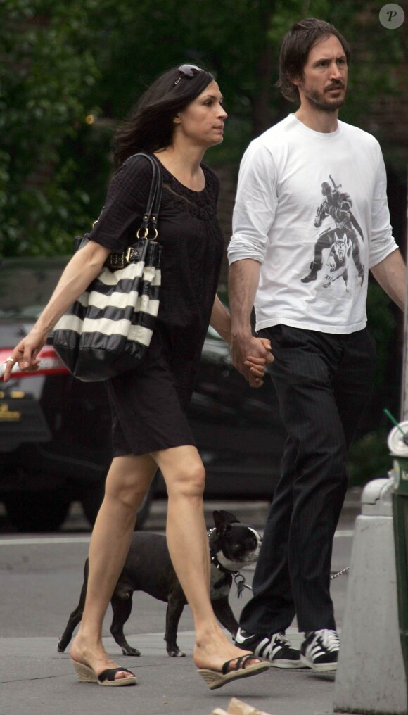 Famke Janssen et son boyfriend Cole Frates à New York, le 1er mai 2010