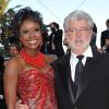 George Lucas et sa bien-aimée Mellody Hobson au 63e festival de Cannes. 14/05/2010