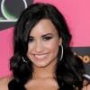 Demi Lovato est-elle tatouée ? Alors qu'elle est en vacances au Mexique, des clichés mettent le doute à Disney et font polémique.