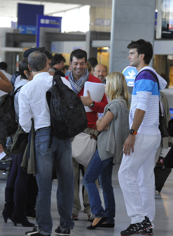 Les candidats sur le point d'embarquer (30 juillet 2010 à l'aéroport de Roissy)