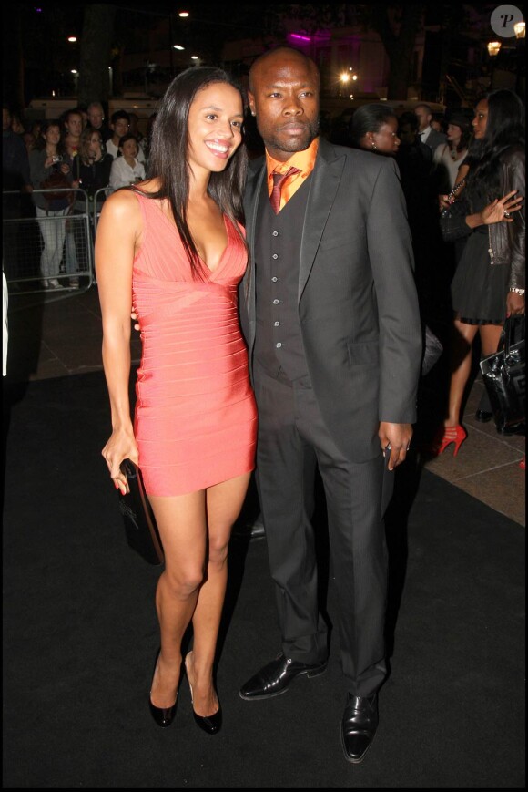 William Gallas et sa chérie à l'occasion du défilé du créateur Ozwald Boateng, lors de la Fashion Week londonienne, le 22 septembre 2010.