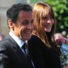 Nicolas Sarkozy et son épouse Carla Bruni arrivent pour une visite de la grotte de Lascaux, non loin du village de Montignac-sur-Vezere le 12 septembre.
