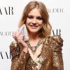 Natalia Vodianova parfaite dans une robe Balmain lors de la soirée Harper's Bazaar à Londres le 1er novembre 2010