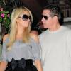 Paris Hilton sort au restaurant Ivy, à Los Angeles, en compagnie de son petit ami Cy Waits, jeudi 2 décembre.