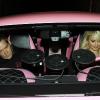 Paris Hilton embarque à bord de sa voiture rose en compagnie de son petit ami Cy Waits et de sa nouvelle bestfriend, Brooke Mueller, accompagnée d'un homme, vendredi 3 décembre, à Los Angeles.
