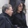 Yasmine Besson (épouse d'Eric Besson) et un ami du défunt, aux obsèques de Gérald Nanty, le 22 décembre 2010, à Paris.
