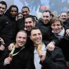 Les héros du hand français, qui ont décroché le 30 janvier 2011 la quatrième couronne mondiale de l'histoire de ce sport en France, ont fait un retour triomphal le 31, accueillis à Roissy, à l'Elysée, puis au store Adidas des Champs.
