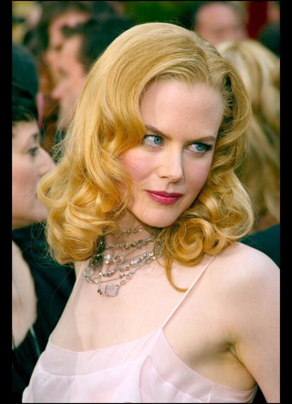A 35 ans, Nicole Kidman a le visage lisse et sans rides, grâce au Botox en 2002.