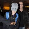 Justin Bieber arrive à l'aéroport d'Heathrow à Londres le 15 février 2011